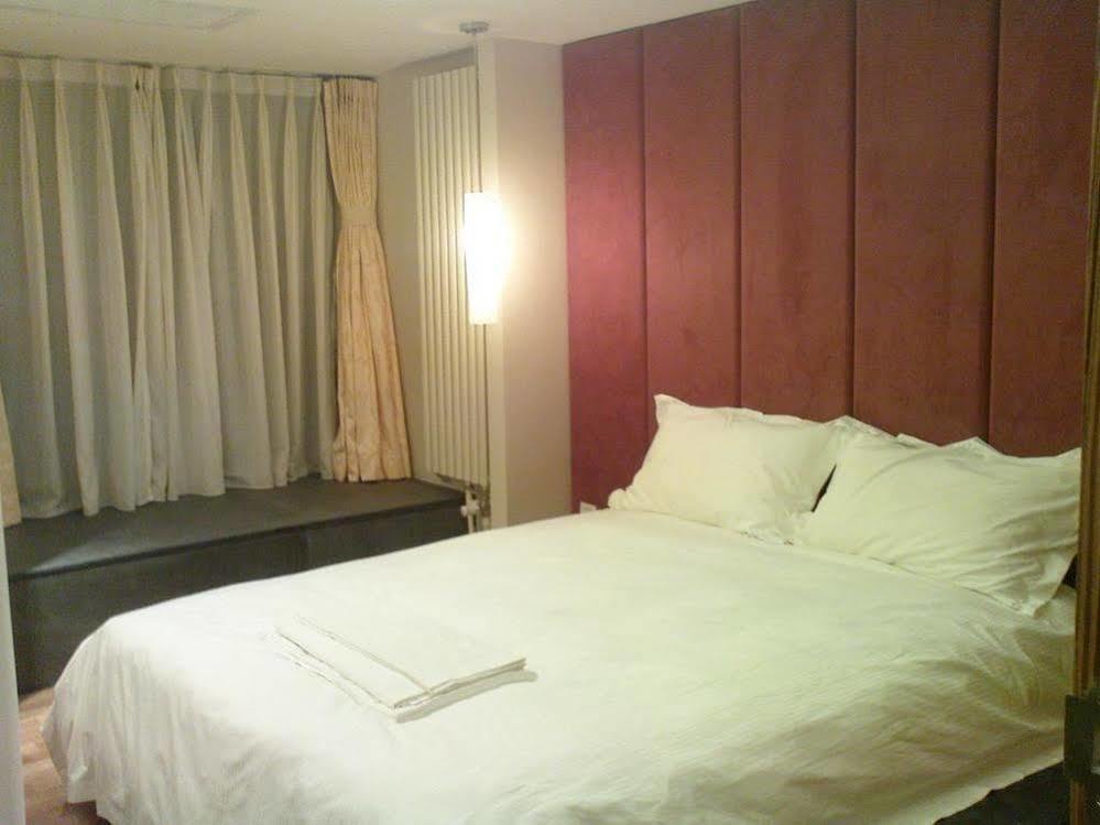 Seasons Park Apart Hotel Beijing Pequim Exterior foto